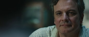 Movie still from “The Railway Man” (2013), directed by Jonathan Teplitzky – A person wearing a checkered shirt; Close Up shot, Over the shoulder angle