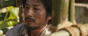 Movie still from “The Railway Man” (2013), directed by Jonathan Teplitzky – A person with a beard; Close Up shot, Low angle