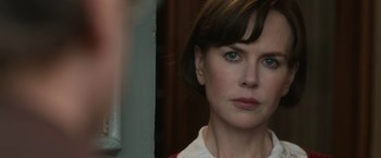 Movie still from “The Railway Man” (2013), directed by Jonathan Teplitzky – A person with short brown hair; Close Up shot, Over the shoulder angle