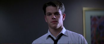 Movie still from “The Rainmaker” (1997), directed by Francis Ford Coppola – A man in a white shirt and a black tie; Close Up shot, Low angle