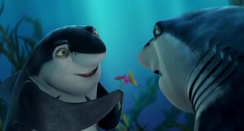 Movie still from “Shark Tale” (2004), directed by Vicky Jenson – A couple of sharks are looking at a flower; Close Up shot, High angle