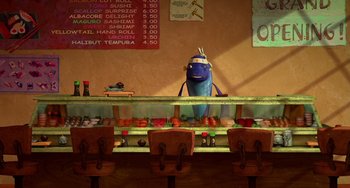 Movie still from “Shark Tale” (2004), directed by Vicky Jenson – A stuffed animal sitting in front of a display case; Wide shot, High angle