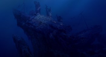 Movie still from “Shark Tale” (2004), directed by Vicky Jenson – A ship is in the ocean under the water at night time; Extreme Wide shot, High angle