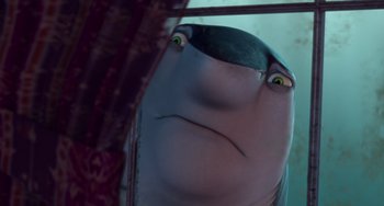Movie still from “Shark Tale” (2004), directed by Vicky Jenson – A fish's face in a mirror; Close Up shot, Low angle