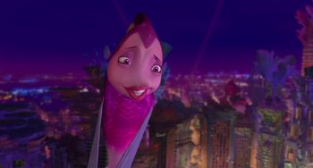 Movie still from “Shark Tale” (2004), directed by Vicky Jenson – A fish with a city in the background; Medium shot, Low angle