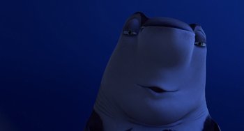 Movie still from “Shark Tale” (2004), directed by Vicky Jenson – A shark's face in the dark; Close Up shot, High angle