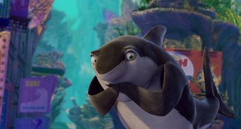 Movie still from “Shark Tale” (2004), directed by Vicky Jenson – A cartoon shark in the water; Close Up shot, High angle