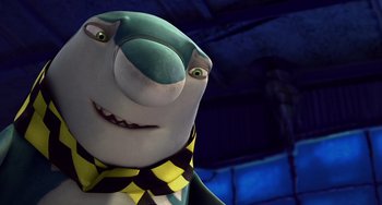 Movie still from “Shark Tale” (2004), directed by Vicky Jenson – A cartoon character in a yellow and black outfit; Close Up shot, Low angle