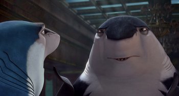 Movie still from “Shark Tale” (2004), directed by Vicky Jenson – A shark and a cat; Close Up shot, Low angle