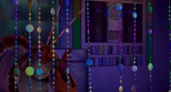 Movie still from “Shark Tale” (2004), directed by Vicky Jenson – A bunch of beads hanging from the side of a building; Close Up shot, Low angle