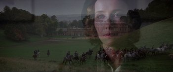Movie still from “The Remains of the Day” (1993), directed by James Ivory – A double exposure of a woman on a horse back; Close Up shot, Low angle