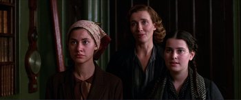 Movie still from “The Remains of the Day” (1993), directed by James Ivory – A group of women standing next to each other; Medium shot, Low angle