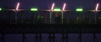 Movie still from “The Remains of the Day” (1993), directed by James Ivory – A group of people standing on top of a pier; Extreme Wide shot, High angle