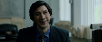 Movie still from “The Report” (2019), directed by Scott Z. Burns – A person wearing a suit and tie; Close Up shot, Over the shoulder angle