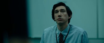 Movie still from “The Report” (2019), directed by Scott Z. Burns – A man wearing a shirt and a tie; Close Up shot, Over the shoulder angle