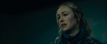 Movie still from “The Report” (2019), directed by Scott Z. Burns – A person wearing a scarf; Close Up shot, Over the shoulder angle