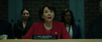 Movie still from “The Report” (2019), directed by Scott Z. Burns – A person sitting at a table; Close Up shot, Over the shoulder angle