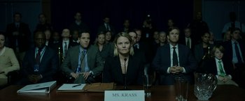 Movie still from “The Report” (2019), directed by Scott Z. Burns – A group of people sitting around a table; Medium shot, Low angle