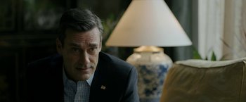 Movie still from “The Report” (2019), directed by Scott Z. Burns – A person wearing a suit and tie; Close Up shot, Over the shoulder angle