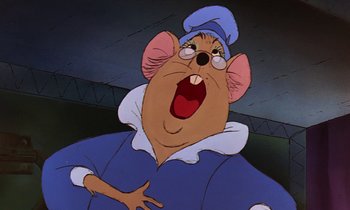 Movie still from “The Rescuers” (1977), directed by Wolfgang Reitherman – A cartoon of a mouse wearing a blue hat; Close Up shot, Low angle