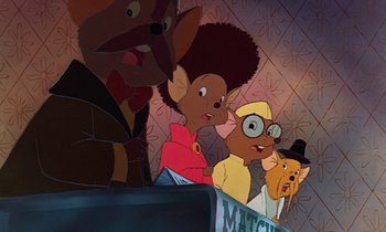 Movie still from “The Rescuers” (1977), directed by Wolfgang Reitherman – A group of people standing next to each other in a room; Medium shot, High angle