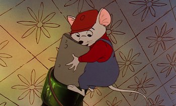 Movie still from “The Rescuers” (1977), directed by Wolfgang Reitherman – A cartoon of a mouse with a red hat on; Medium shot, High angle