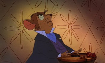 Movie still from “The Rescuers” (1977), directed by Wolfgang Reitherman – A cartoon of a mouse wearing a suit and tie; Close Up shot, Low angle