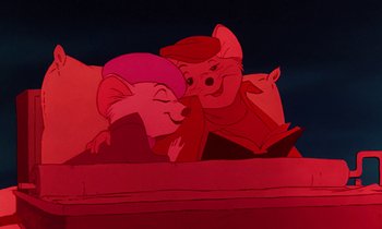 Movie still from “The Rescuers” (1977), directed by Wolfgang Reitherman – A couple of cartoon characters sitting next to each other on a bed; Medium shot, High angle
