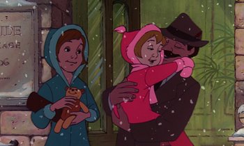 Movie still from “The Rescuers” (1977), directed by Wolfgang Reitherman – A man and a woman holding a child in a snowy scene; Medium shot, Over the shoulder angle