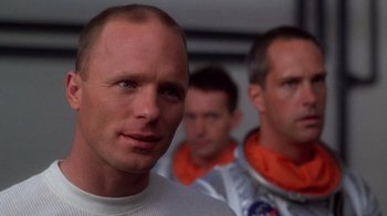 Movie still from “The Right Stuff” (1983), directed by Philip Kaufman – A group of men standing next to each other in a room; Close Up shot, Low angle