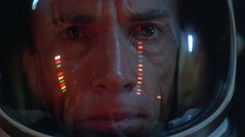 Movie still from “The Right Stuff” (1983), directed by Philip Kaufman – A person wearing a space helmet; Close Up shot, Low angle