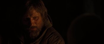 Movie still from “The Road” (2009), directed by John Hillcoat – A person with a beard; Close Up shot, Over the shoulder angle