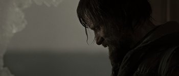 Movie still from “The Road” (2009), directed by John Hillcoat – A person with wet hair; Close Up shot, Over the shoulder angle