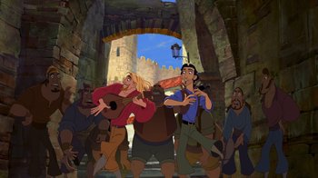Movie still from “The Road to El Dorado” (2000), directed by Bibo Bergeron – A group of people standing in front of a stone wall; Wide shot, Low angle