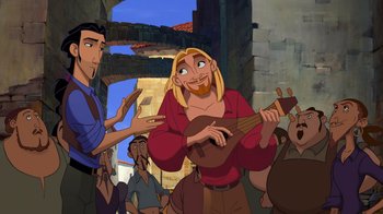 Movie still from “The Road to El Dorado” (2000), directed by Bibo Bergeron – A man with a beard is playing a guitar; Medium shot, Over the shoulder angle