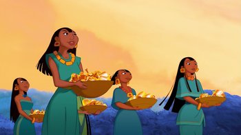 Movie still from “The Road to El Dorado” (2000), directed by Bibo Bergeron – Three animated women are holding baskets of fruit; Wide shot, Low angle
