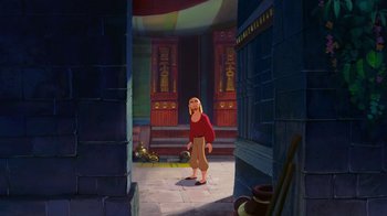 Movie still from “The Road to El Dorado” (2000), directed by Bibo Bergeron – An image of an animated scene of a man standing in a doorway; Wide shot, Low angle
