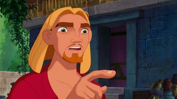 Movie still from “The Road to El Dorado” (2000), directed by Bibo Bergeron – A man with long blond hair is pointing to the side; Close Up shot, Over the shoulder angle