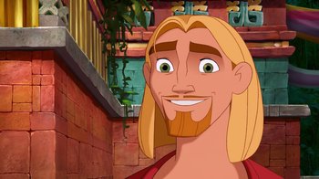 Movie still from “The Road to El Dorado” (2000), directed by Bibo Bergeron – A man with long blond hair is smiling; Close Up shot, Over the shoulder angle