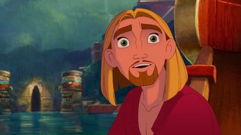 Movie still from “The Road to El Dorado” (2000), directed by Bibo Bergeron – A man with long blond hair and green eyes looking at the camera; Close Up shot, Over the shoulder angle