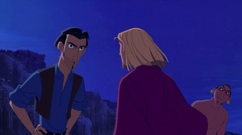 Movie still from “The Road to El Dorado” (2000), directed by Bibo Bergeron – A man and a woman standing next to each other in front of a mountain; Medium shot, Over the shoulder angle