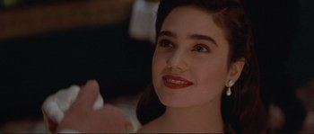 Movie still from “The Rocketeer” (1991), directed by Joe Johnston – A person holding a toothbrush; Close Up shot, Over the shoulder angle