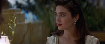 Movie still from “The Rocketeer” (1991), directed by Joe Johnston – A person wearing a white shirt; Close Up shot, Over the shoulder angle