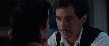 Movie still from “The Rocketeer” (1991), directed by Joe Johnston – A person talking to another person; Close Up shot, Over the shoulder angle