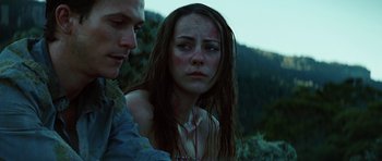 Movie still from “The Ruins” (2008), directed by Carter Smith – A woman with blood all over her face and neck; Close Up shot, Low angle