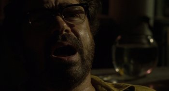 Movie still from “The Rum Diary” (2011), directed by Bruce Robinson – A person with a beard and glasses; Close Up shot, Low angle