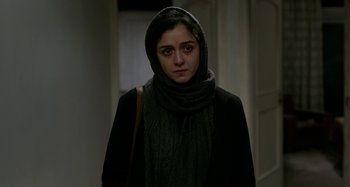 Movie still from “The Salesman” (2016), directed by Asghar Farhadi – A woman with a scarf on her head; Close Up shot, Over the shoulder angle