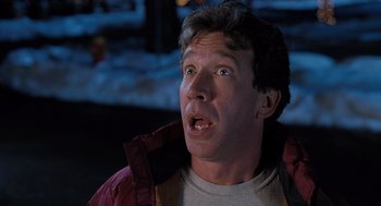 Movie still from “The Santa Clause” (1994), directed by John Pasquin – A person wearing a jacket; Close Up shot, Low angle
