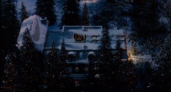 Movie still from “The Santa Clause” (1994), directed by John Pasquin – An aerial view of a house decorated for christmas; Extreme Wide shot, High angle