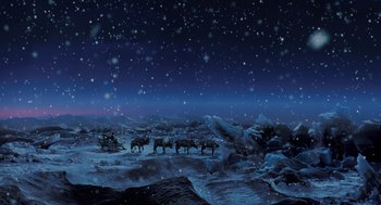 Movie still from “The Santa Clause” (1994), directed by John Pasquin – A herd of animals walking across a snow covered field at night; Extreme Wide shot, High angle
